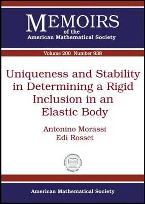 Uniqueness and Stability in Determining a Rigid Inclusion in an Elastic Body