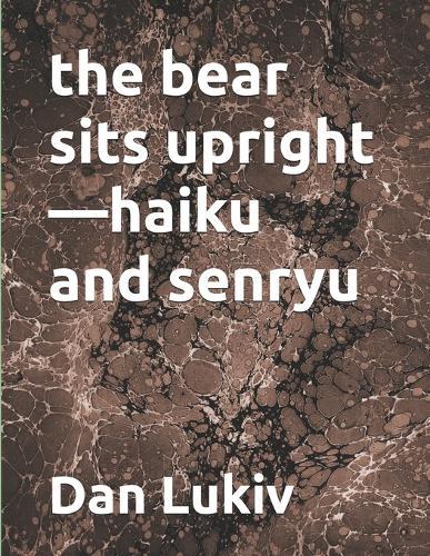 The bear sits upright-haiku and senryu